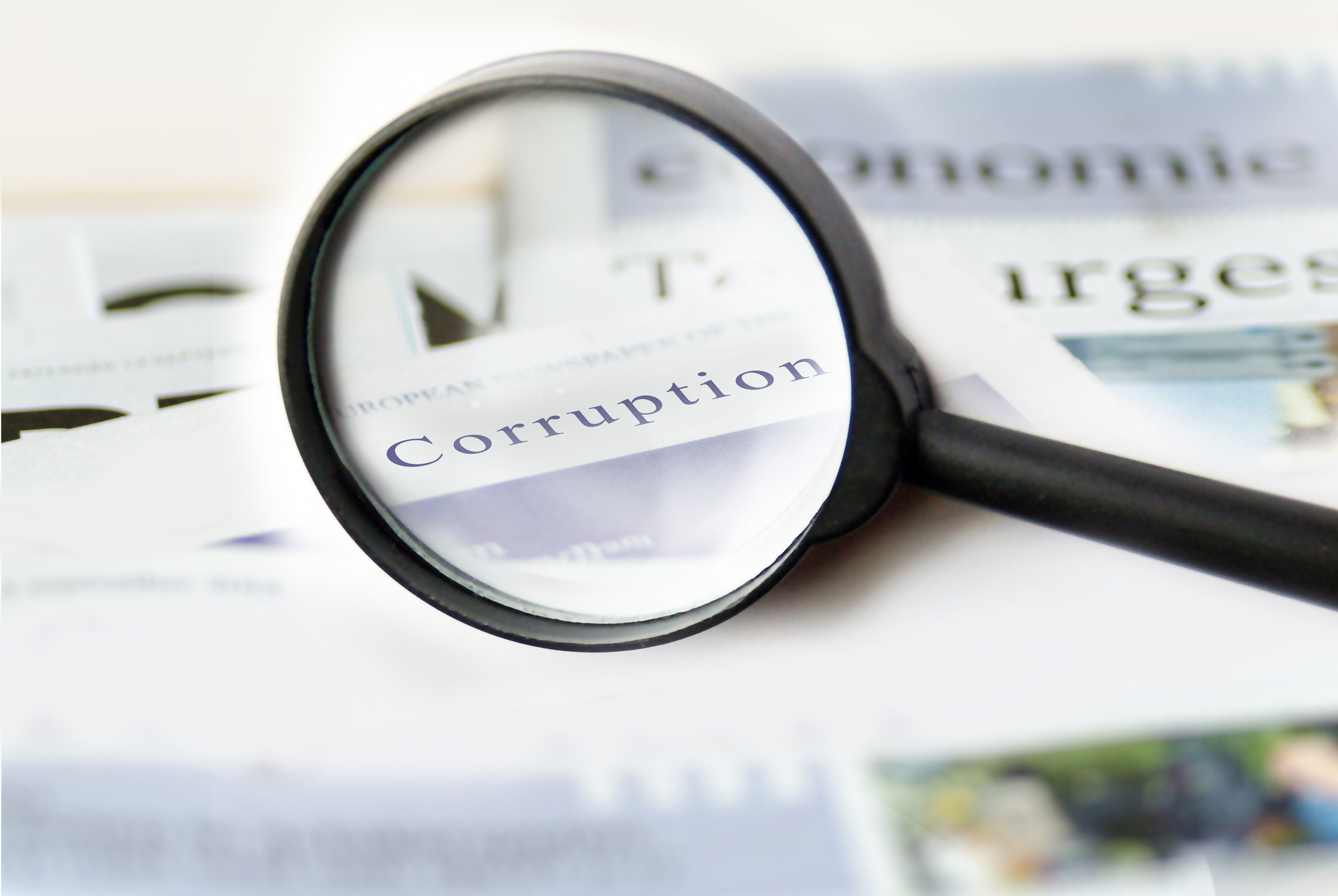 Corruption in magnifying glass